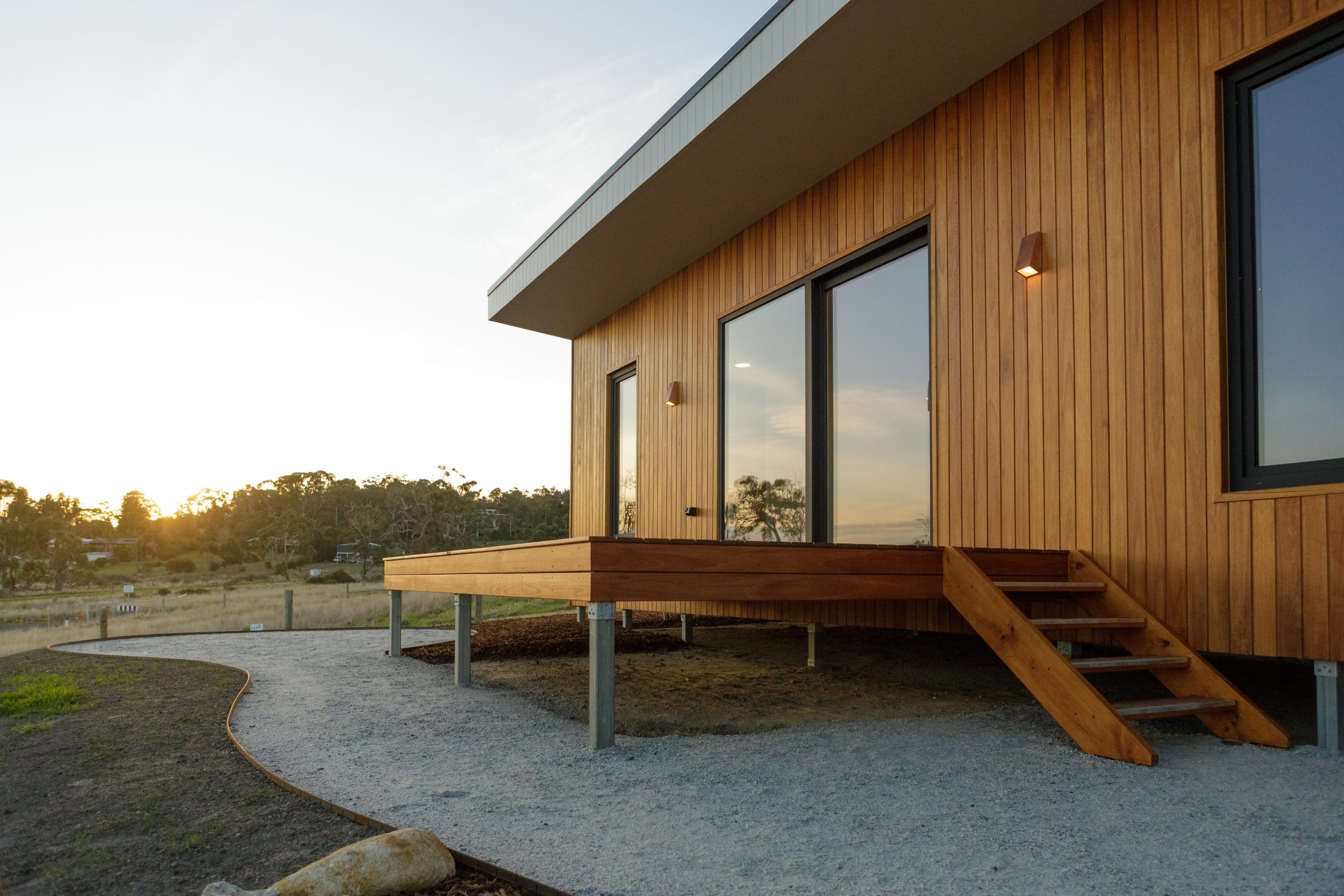 A completed Hycon home with timber cladding at dusk in Gippsland, Victoria